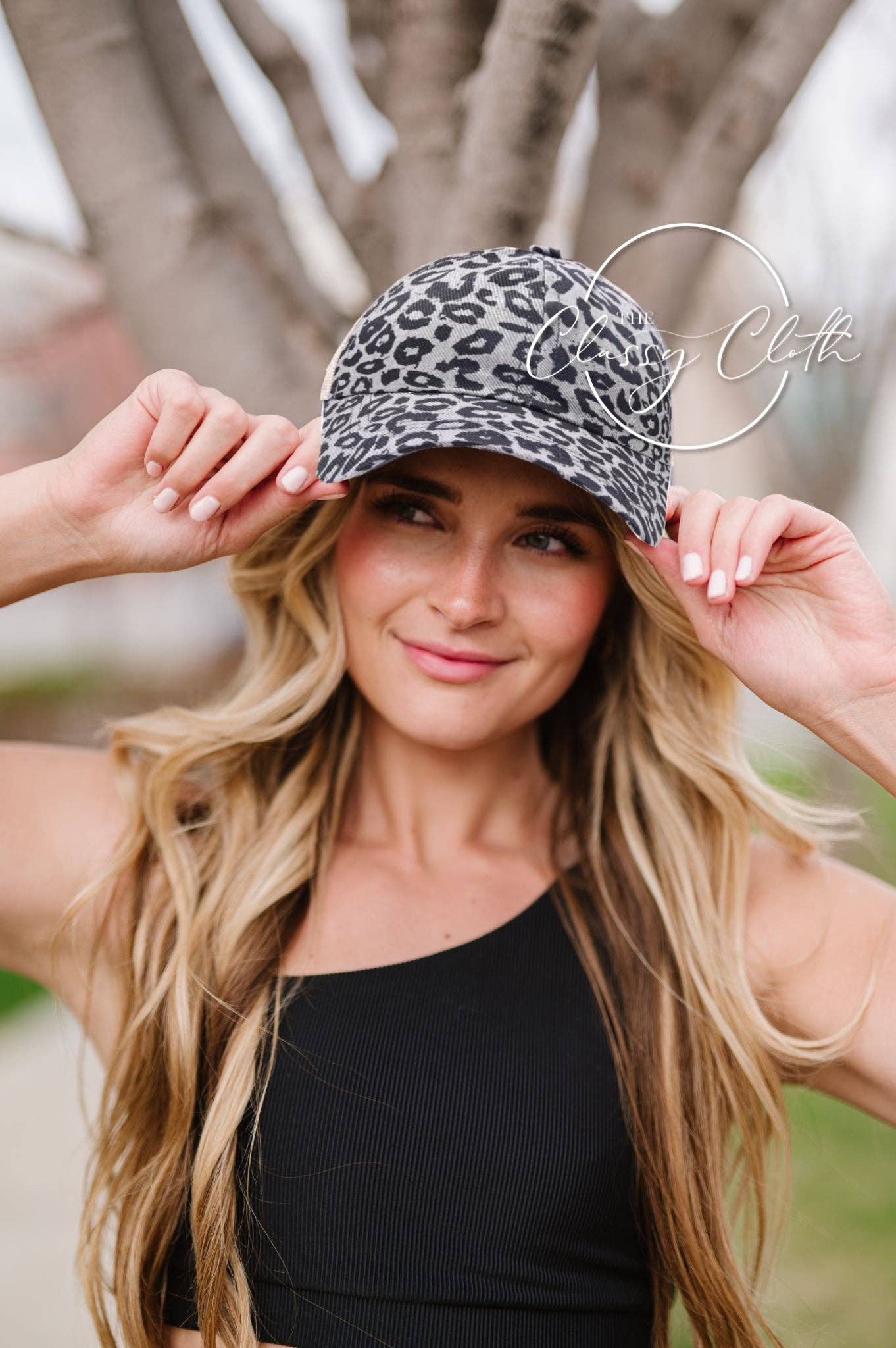 Grey Leopard Ponytail Criss Cross Trucker Hat