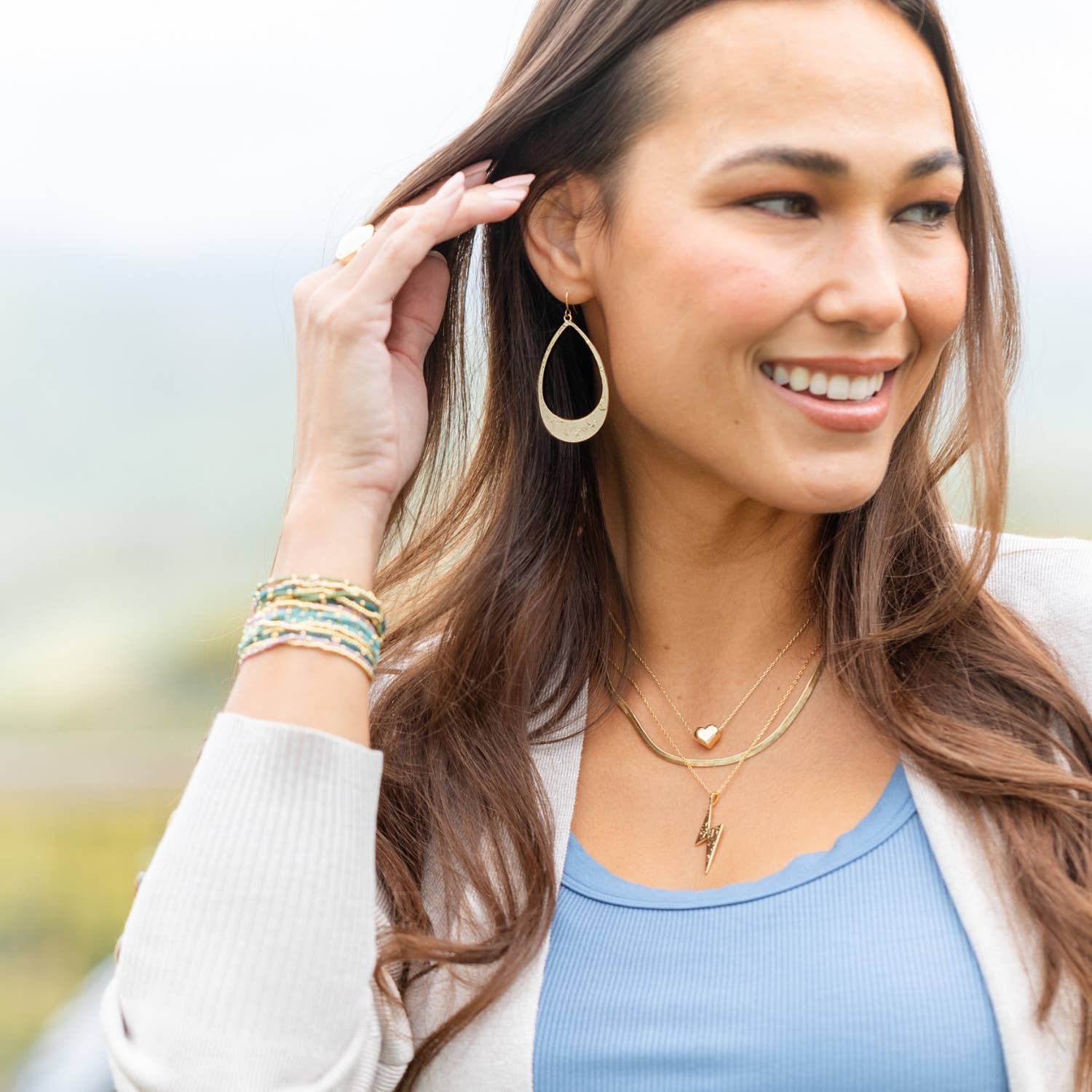 Long Gilded Contemporary Teardrop Earrings