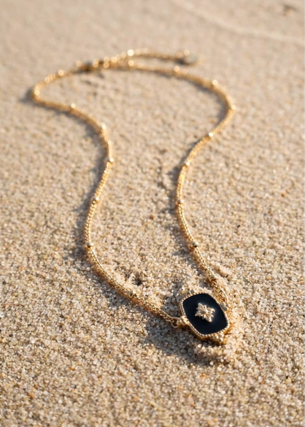Luxe Gold Necklace with Black & Gold Pendant